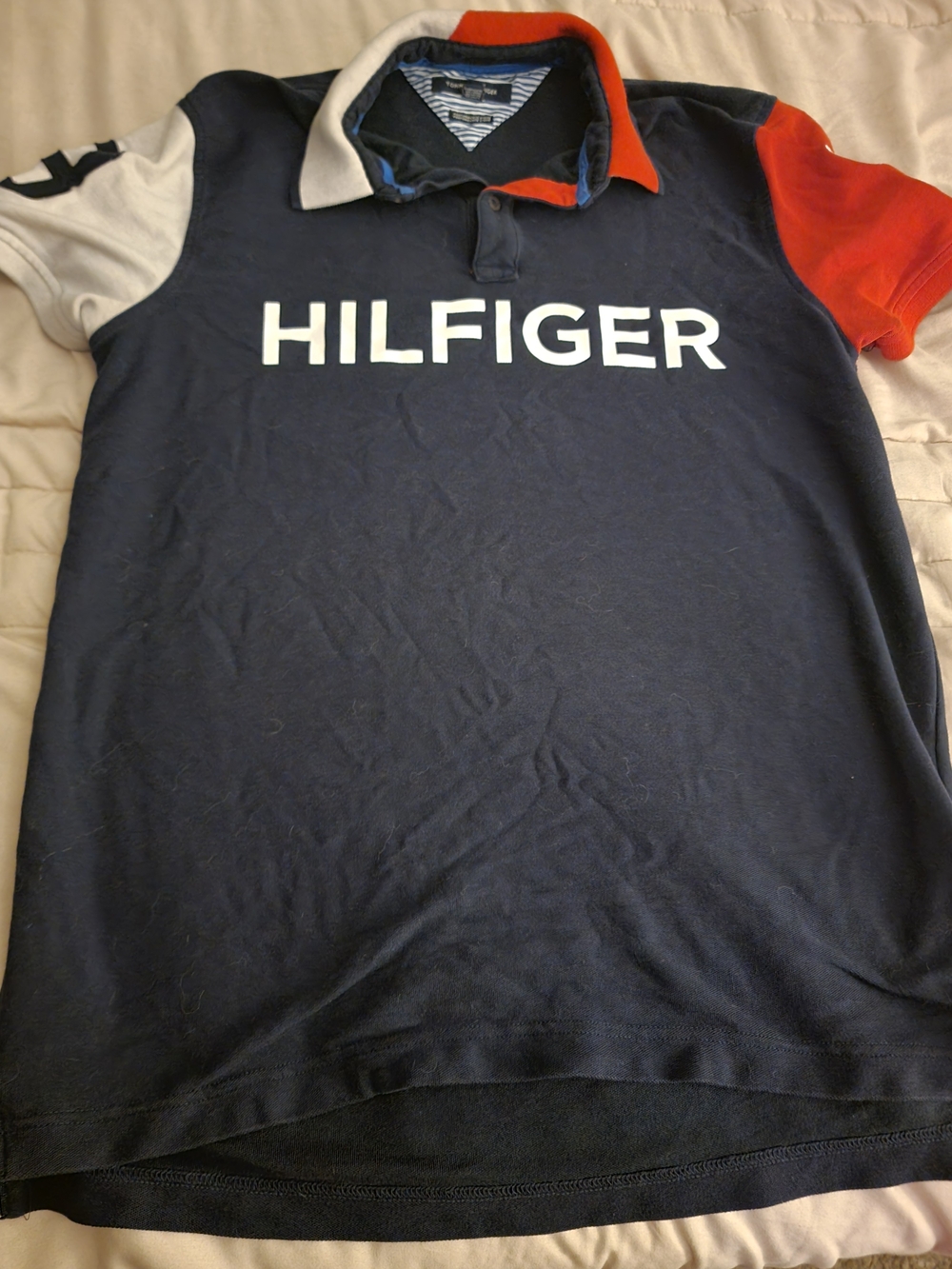 Tommy Hilfiger Navy Polo with Red and White Sleeve Accents